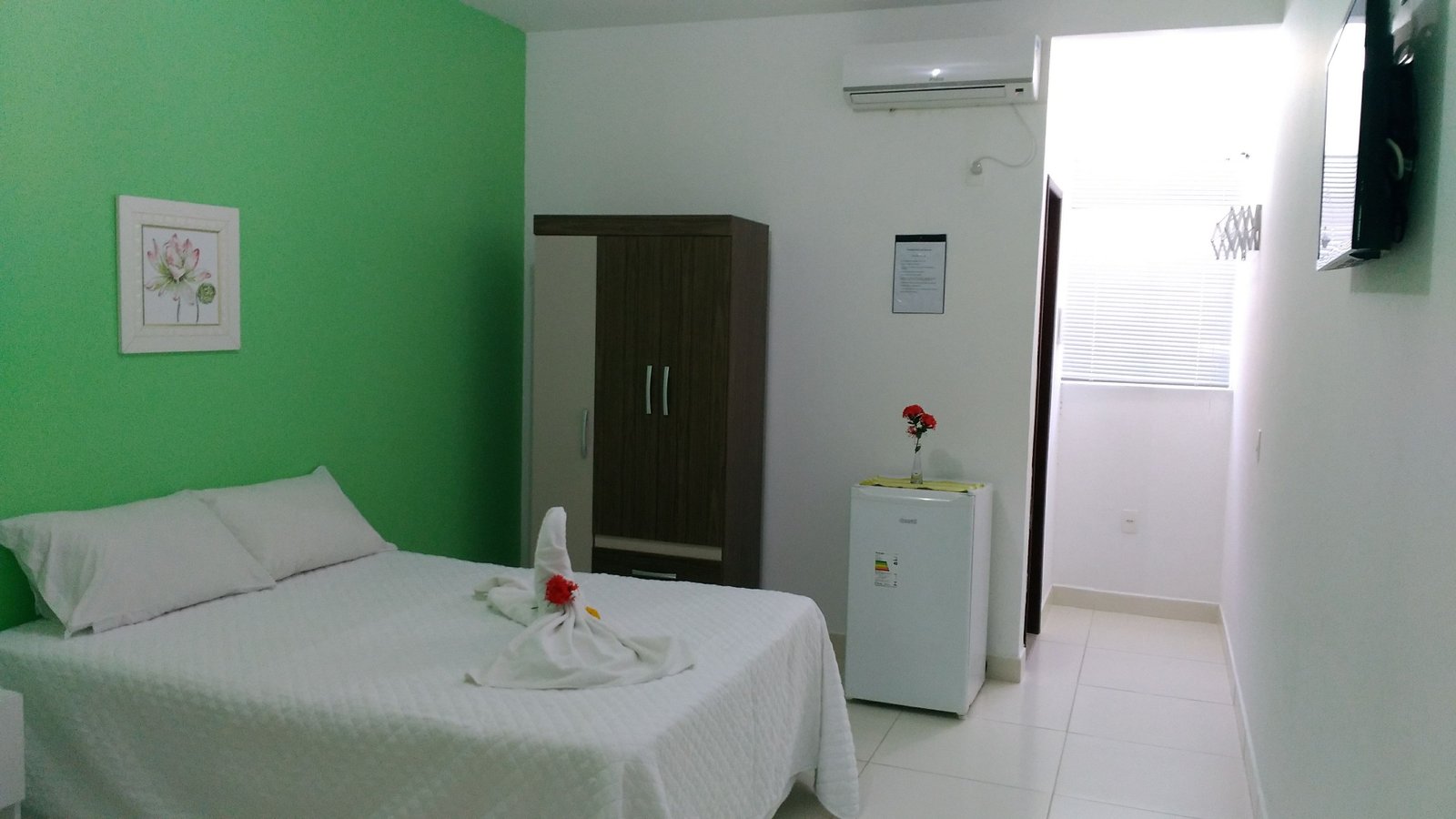 Quarto de casal com cama box